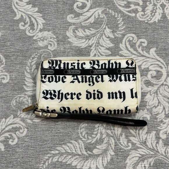 Lesportsac Handbags - LeSportsac L.A.M.B by Gwen Stefani Wristlet Wallet White Gothic Script